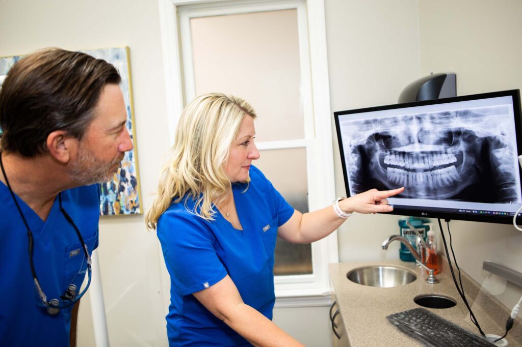 Action shot of doctors - Fort Mill Dentistry
